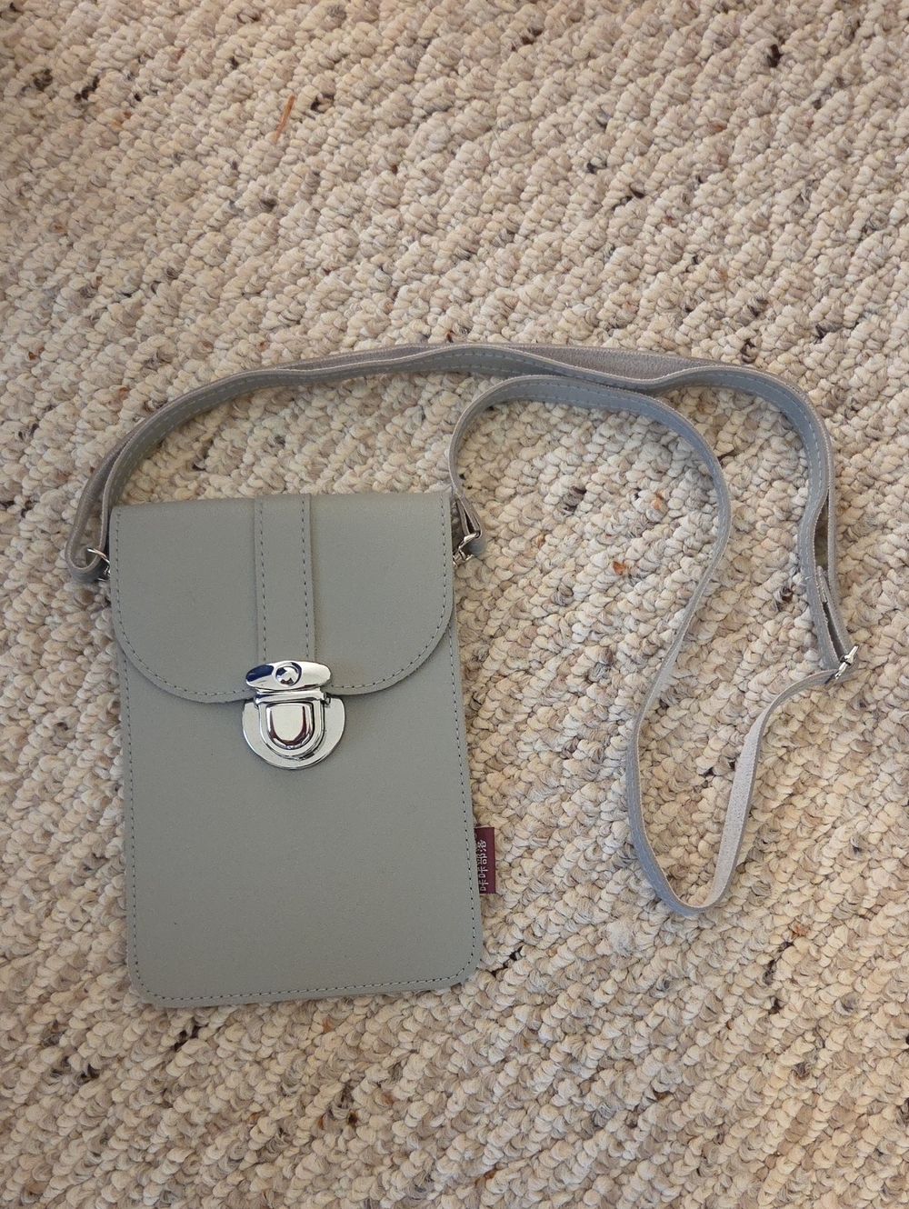 Sleek Light Gray Crossbody Bag with Silver Turn-Lock